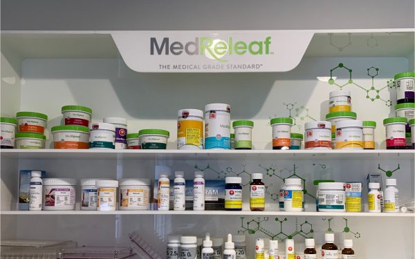 Medicine shelf with jars of cannabis products